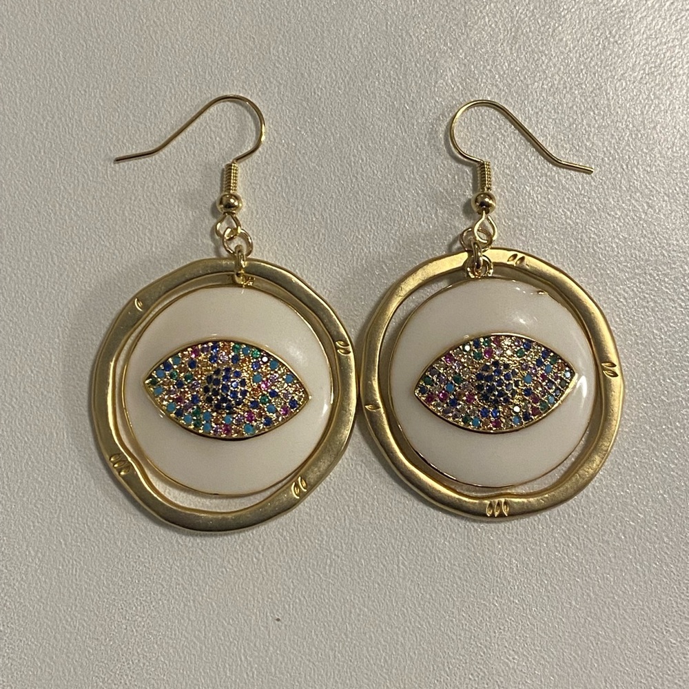 Seeing eye gold hoop earrings